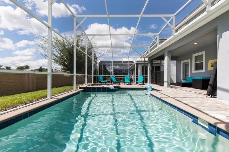 Private screened pool and spa behind the house