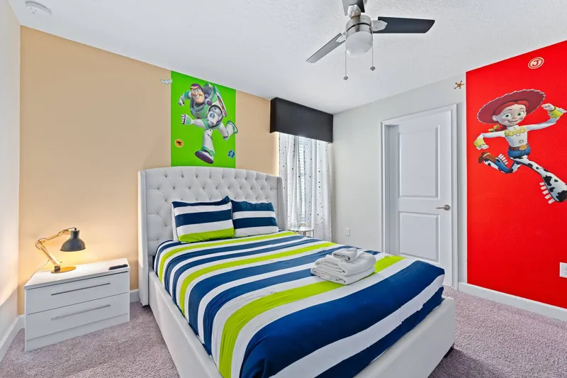 Toy Story bedroom with Buzz Lightyear and Cars murals