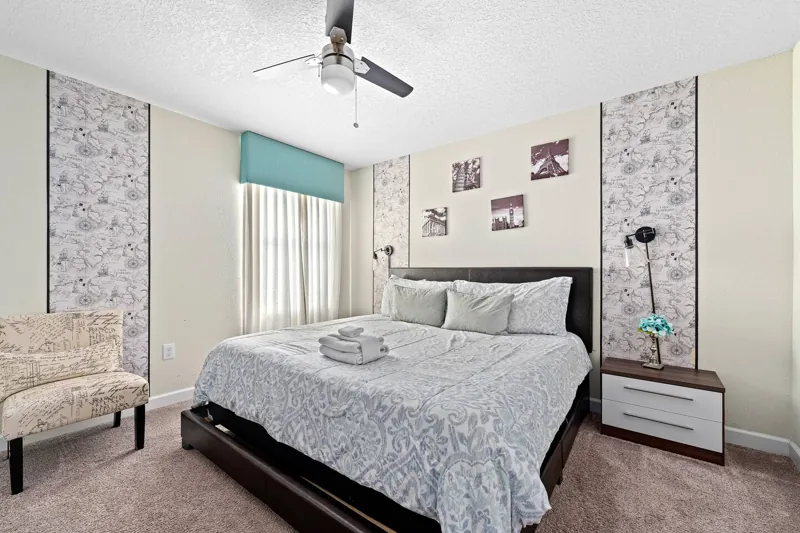 City-themed bedroom with framed photographs