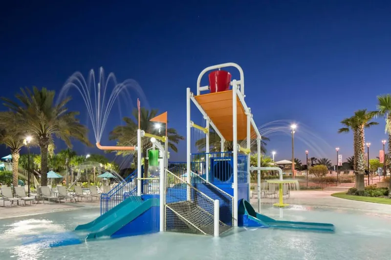 Resort splash pad at dusk